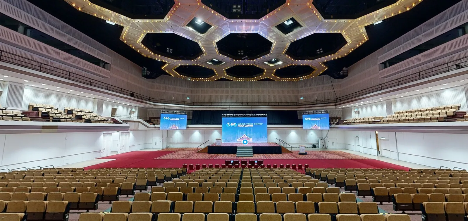 A 360-degree view of the ornate, geometric dome ceiling of the World Trade Centre Kuala Lumpur, an example of an interactive virtual tour in Asia